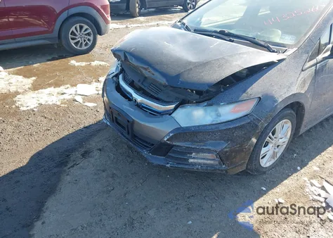 2013 Honda Insight z USA, uszkodzony, nr VIN JHMZE2H31DS006188
